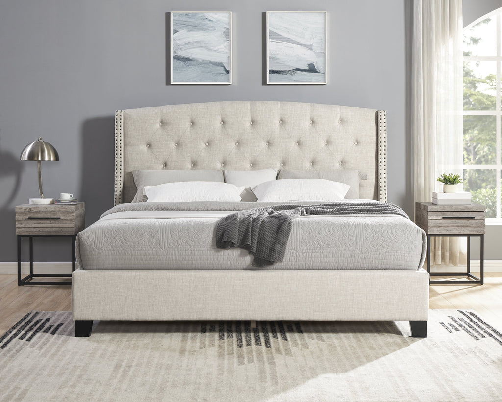 Beige upholstered bed with tufted headboard in a bedroom setting.